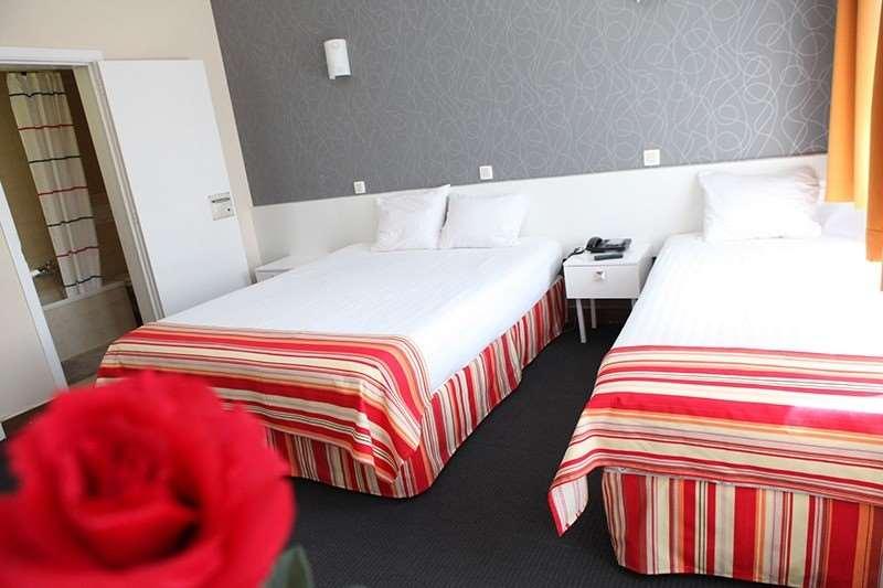 Hotel De France Saint-Gilles Szoba fotó